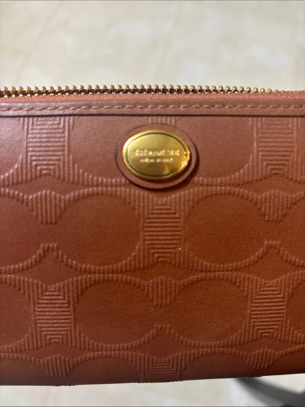 Coach Embossed Leather Accordian Zip Wallet
